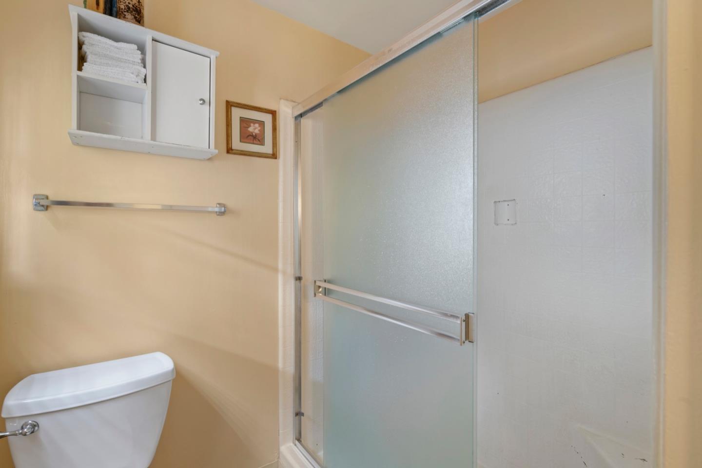 2885 Berryessa Road San Jose, CA 95132 - Photo 18 of 21 a white toilet sitting next to a shower