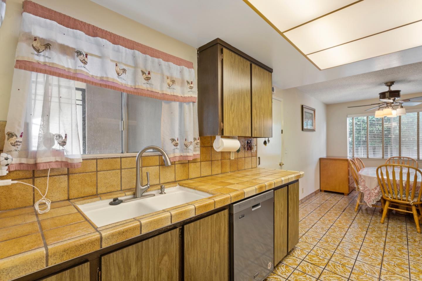 2885 Berryessa Road San Jose, CA 95132 - Photo 2 of 21 a bathroom with a sink and a mirror