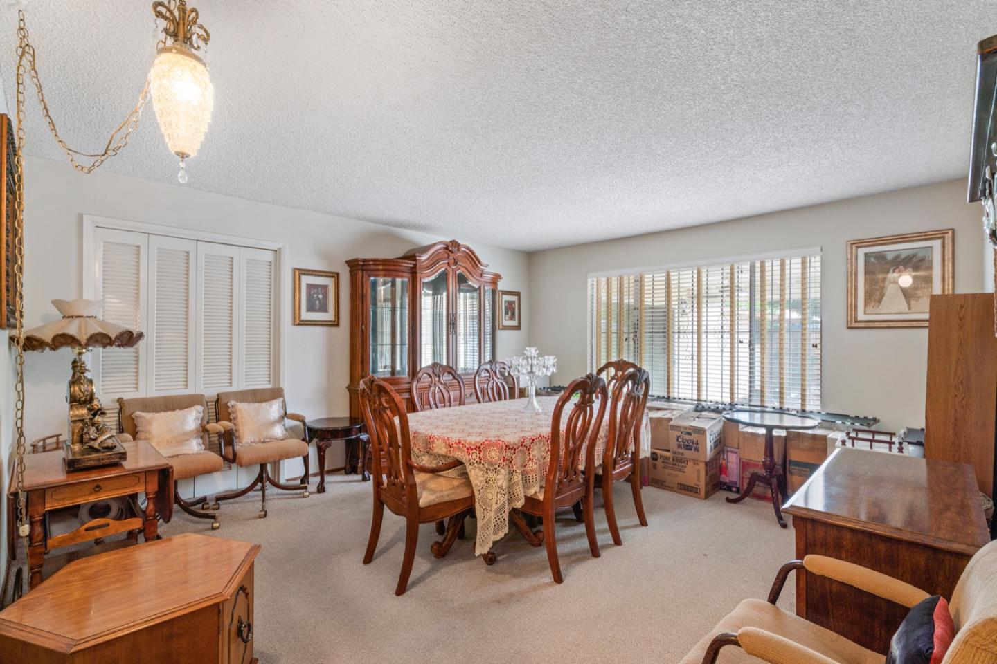 2885 Berryessa Road San Jose, CA 95132 - Photo 6 of 21 a view of a livingroom with furniture and windows
