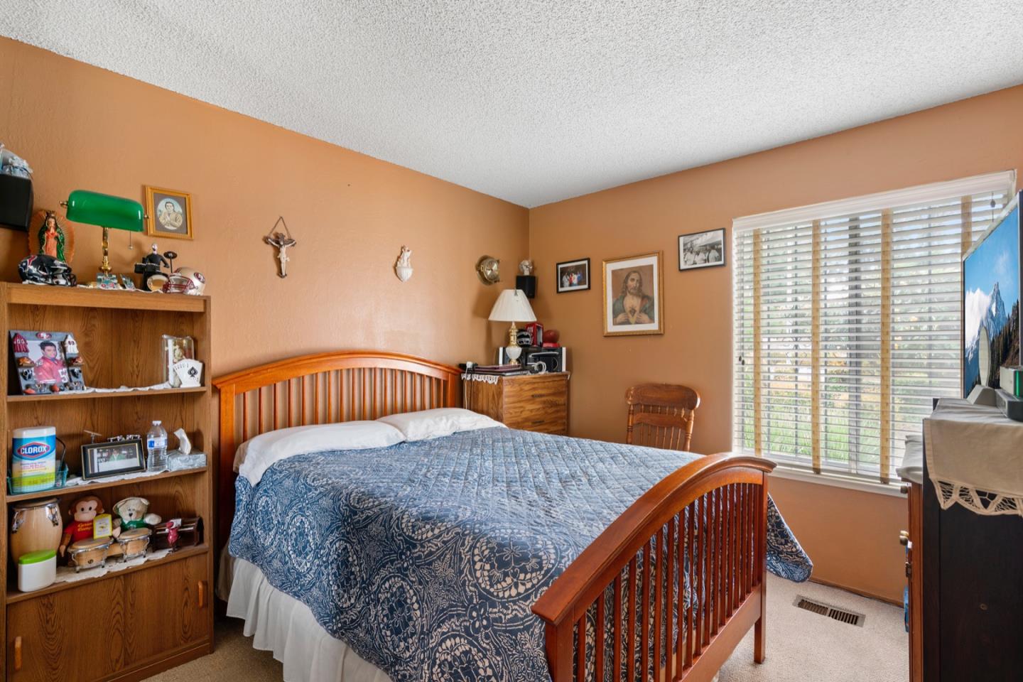 2885 Berryessa Road San Jose, CA 95132 - Photo 10 of 21 a bedroom with a bed and a window