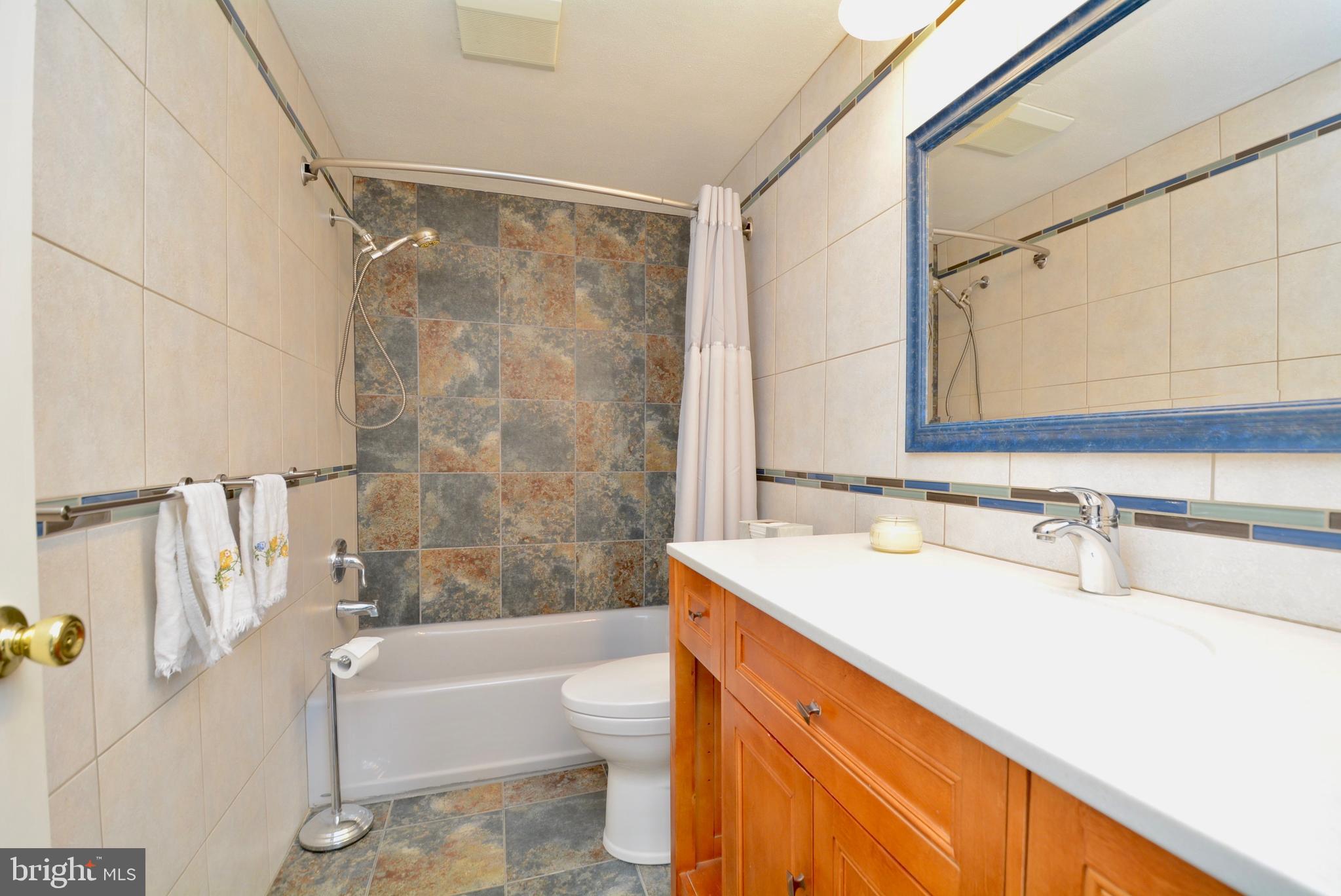 5947 Hall Street Springfield, VA 22152 - Photo 17 of 38 Renovated Hall Bath.
