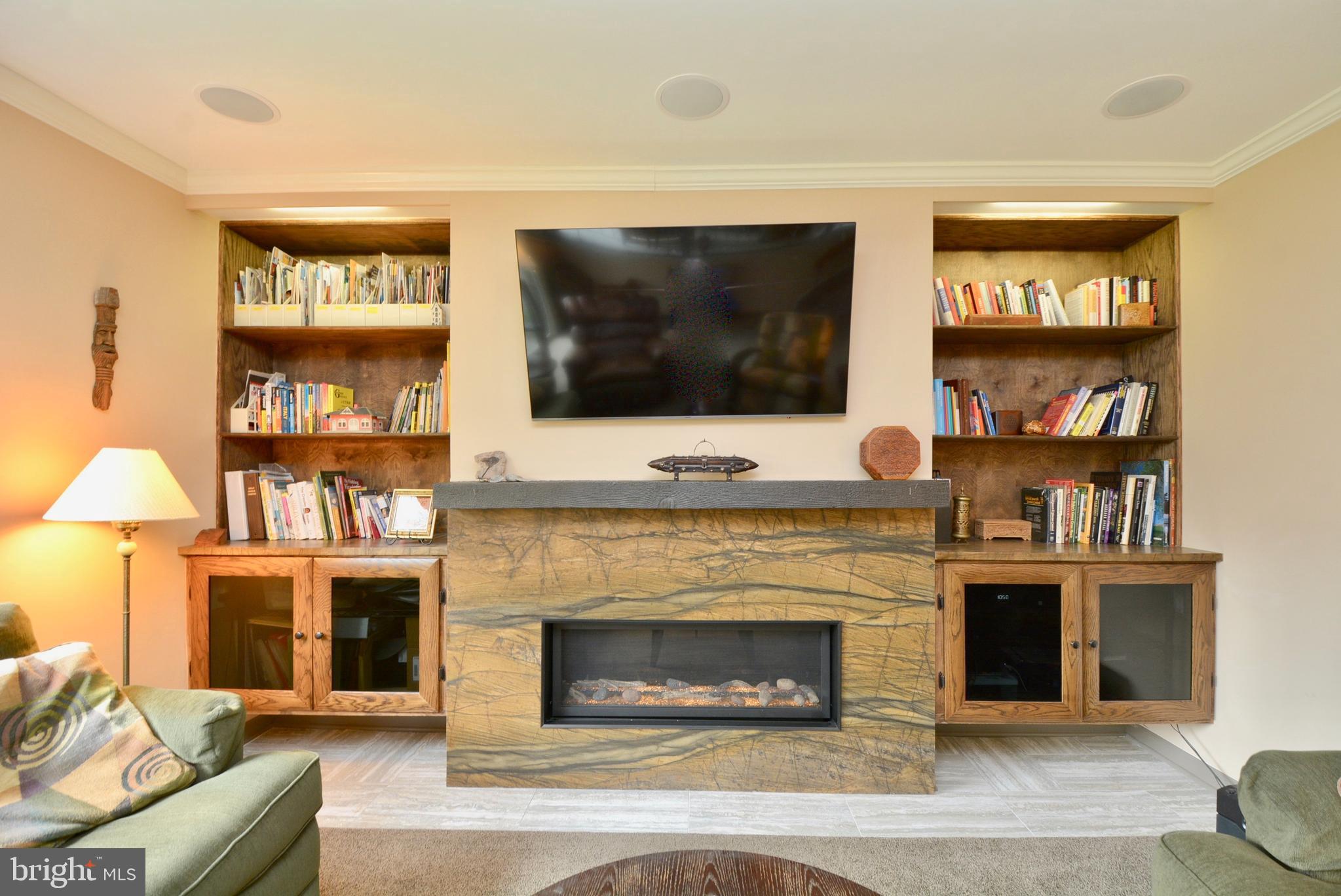 5947 Hall Street Springfield, VA 22152 - Photo 26 of 38 Customized Fireplace wall with built-in shelves.