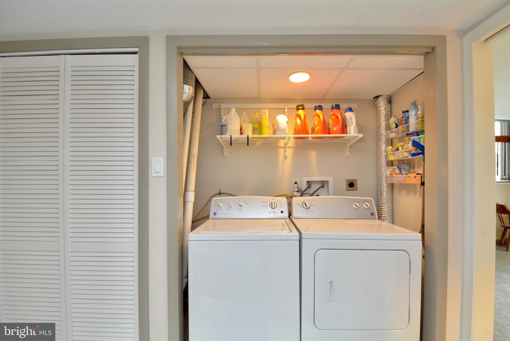 5947 Hall Street Springfield, VA 22152 - Photo 29 of 38 Washer/Dryer and shelving above conveys.
