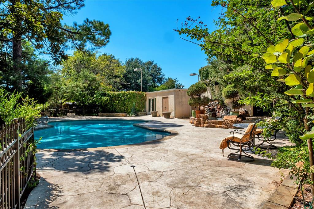 9909 Preston Road Dallas, TX 75230 - Photo 18 of 22 a view of a backyard with a sitting area