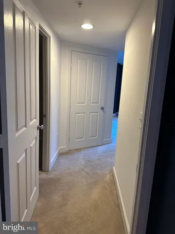 a bathroom with a sink a mirror and shower