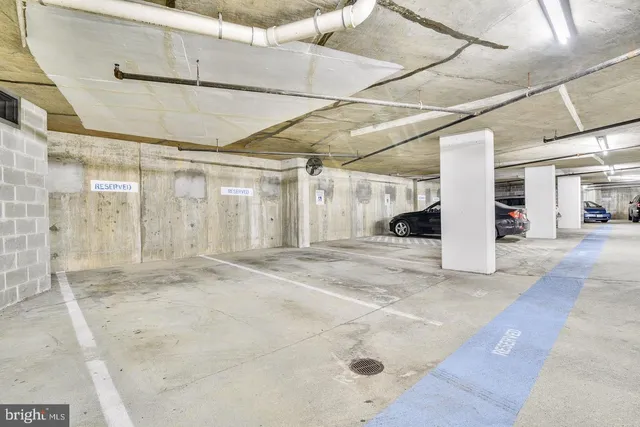 a view of a swimming pool with a lounge chairs