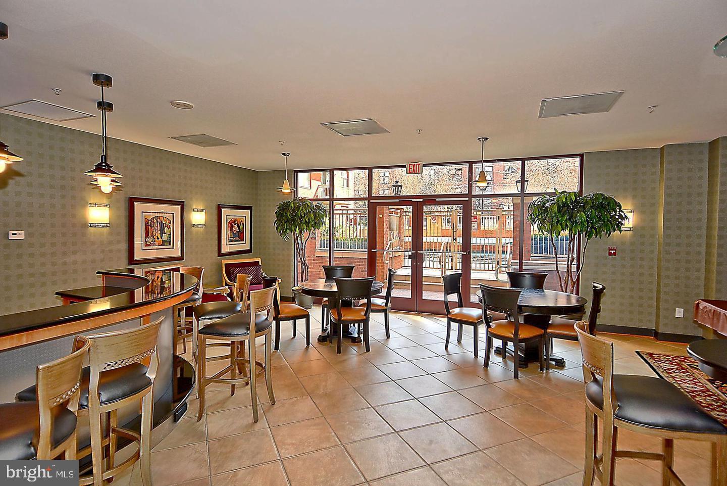 1220 North Fillmore Street, Unit 901 Arlington, VA 22201 - Photo 26 of 35 a view of a dining room with furniture window and outside view