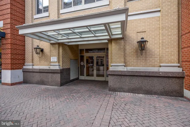 a view of a building with a window and door
