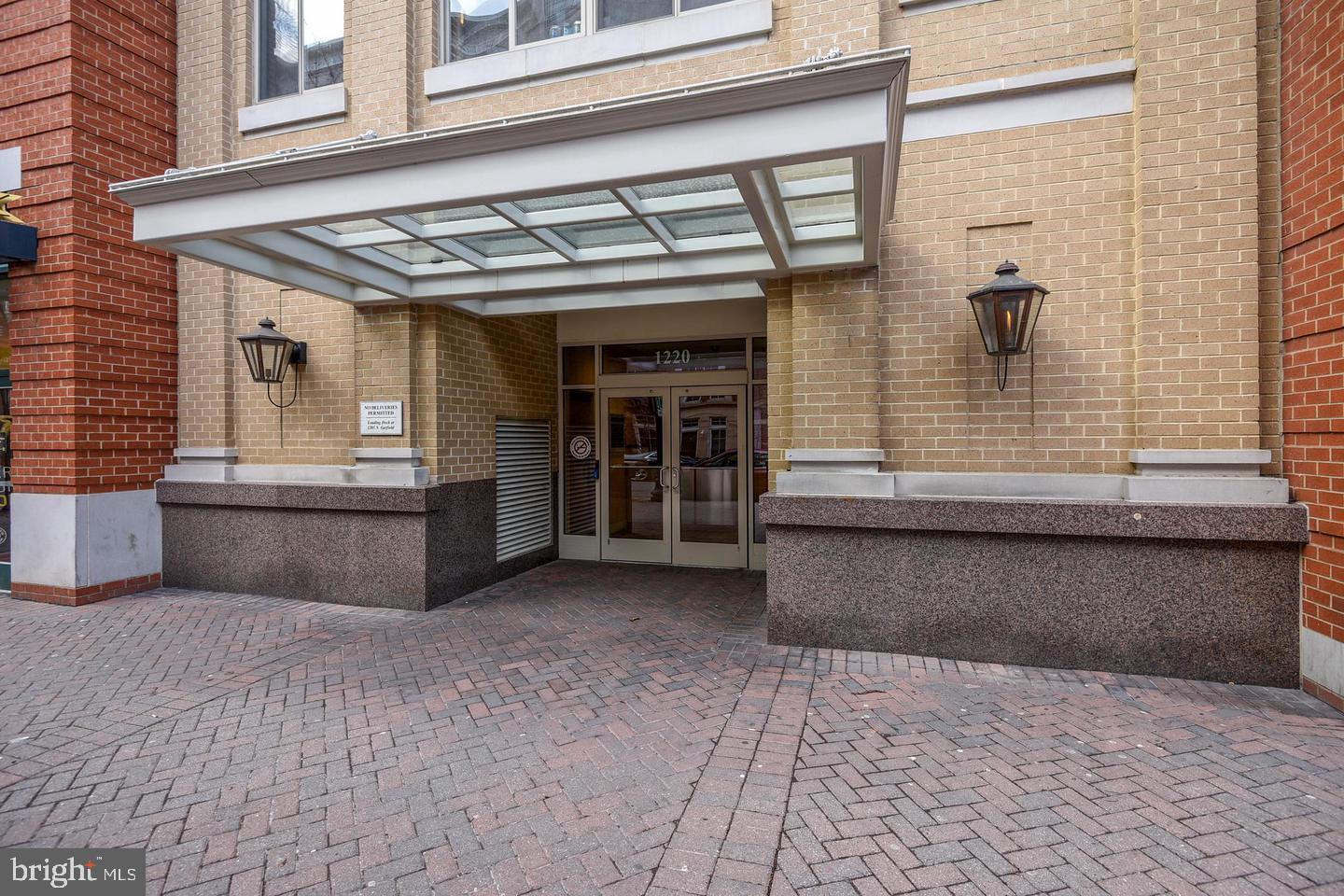 1220 North Fillmore Street, Unit 901 Arlington, VA 22201 - Photo 3 of 35 a view of a building with a window and door