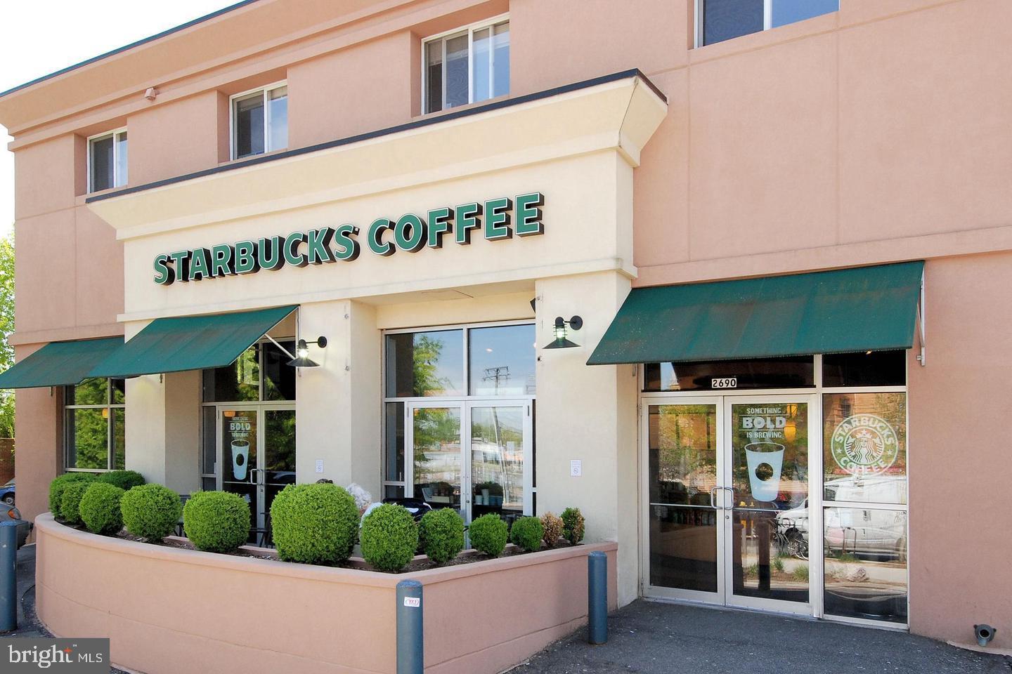 1220 North Fillmore Street, Unit 901 Arlington, VA 22201 - Photo 31 of 35 a front view of a building with entryway