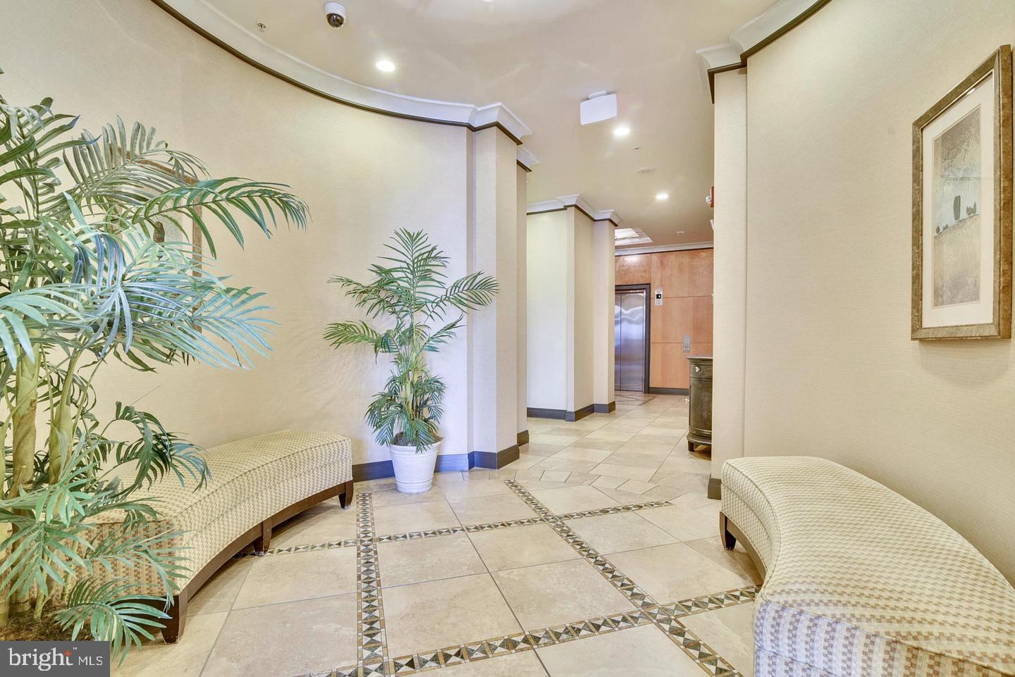 1220 North Fillmore Street, Unit 901 Arlington, VA 22201 - Photo 5 of 35 a bathroom with a bathtub and a shower