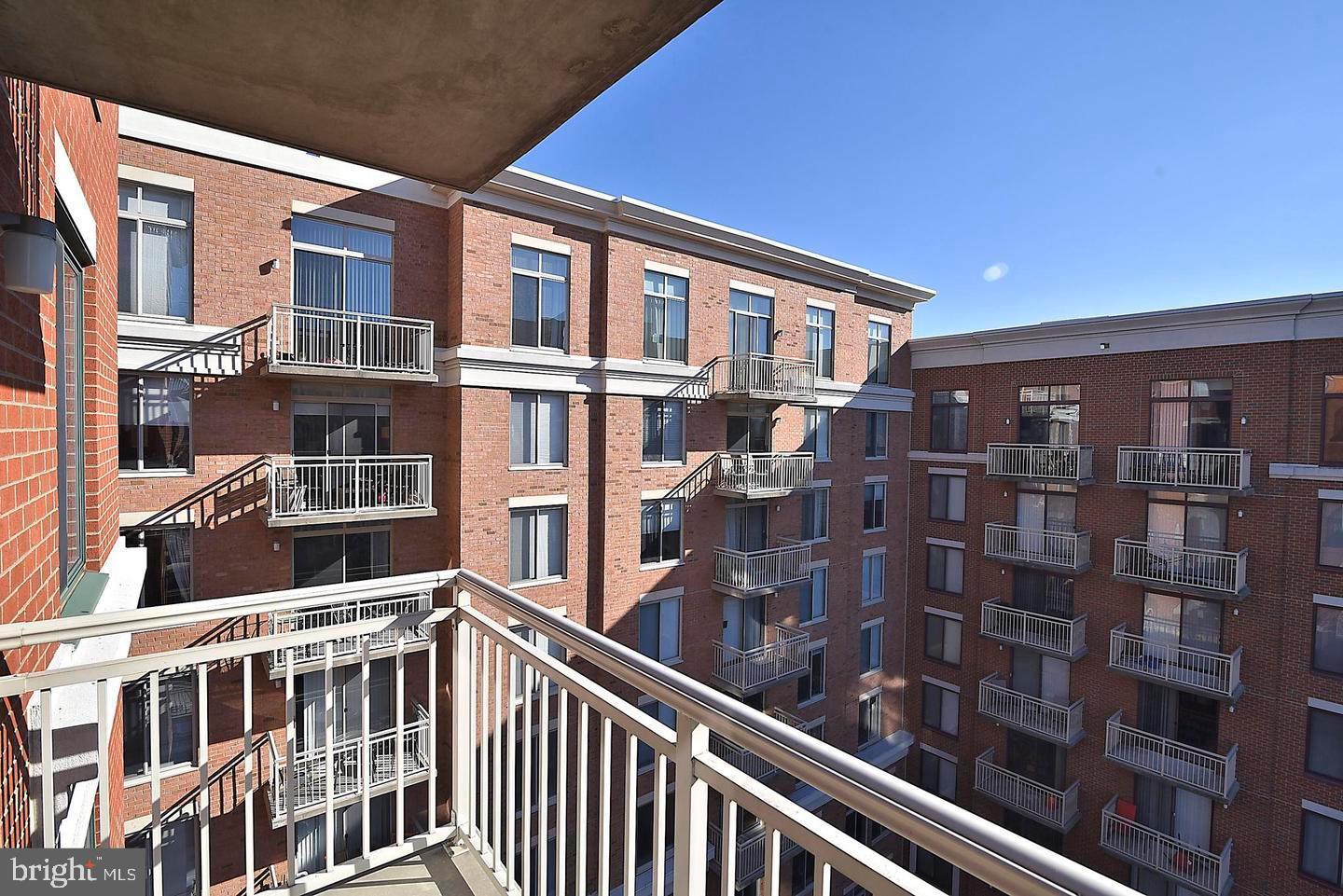 1220 North Fillmore Street, Unit 901 Arlington, VA 22201 - Photo 6 of 35 a view of building from balcony