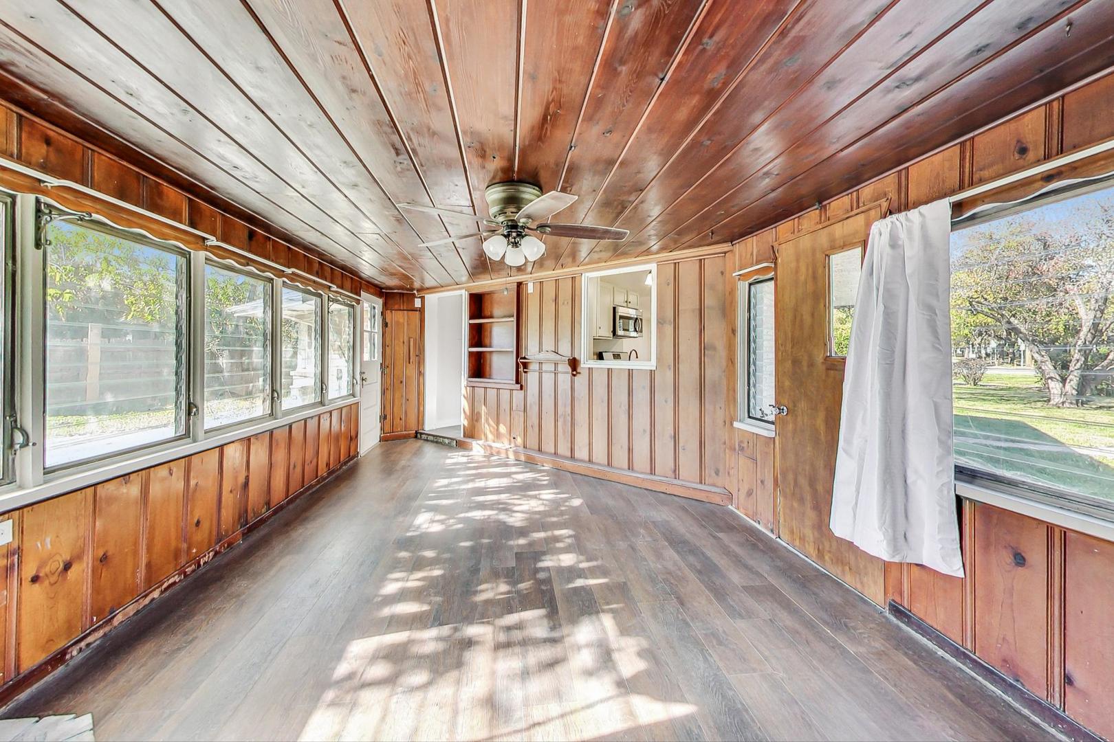 1205 183rd Street Homewood, IL 60430 - Photo 13 of 20 a view of a porch with wooden floor and outdoor space