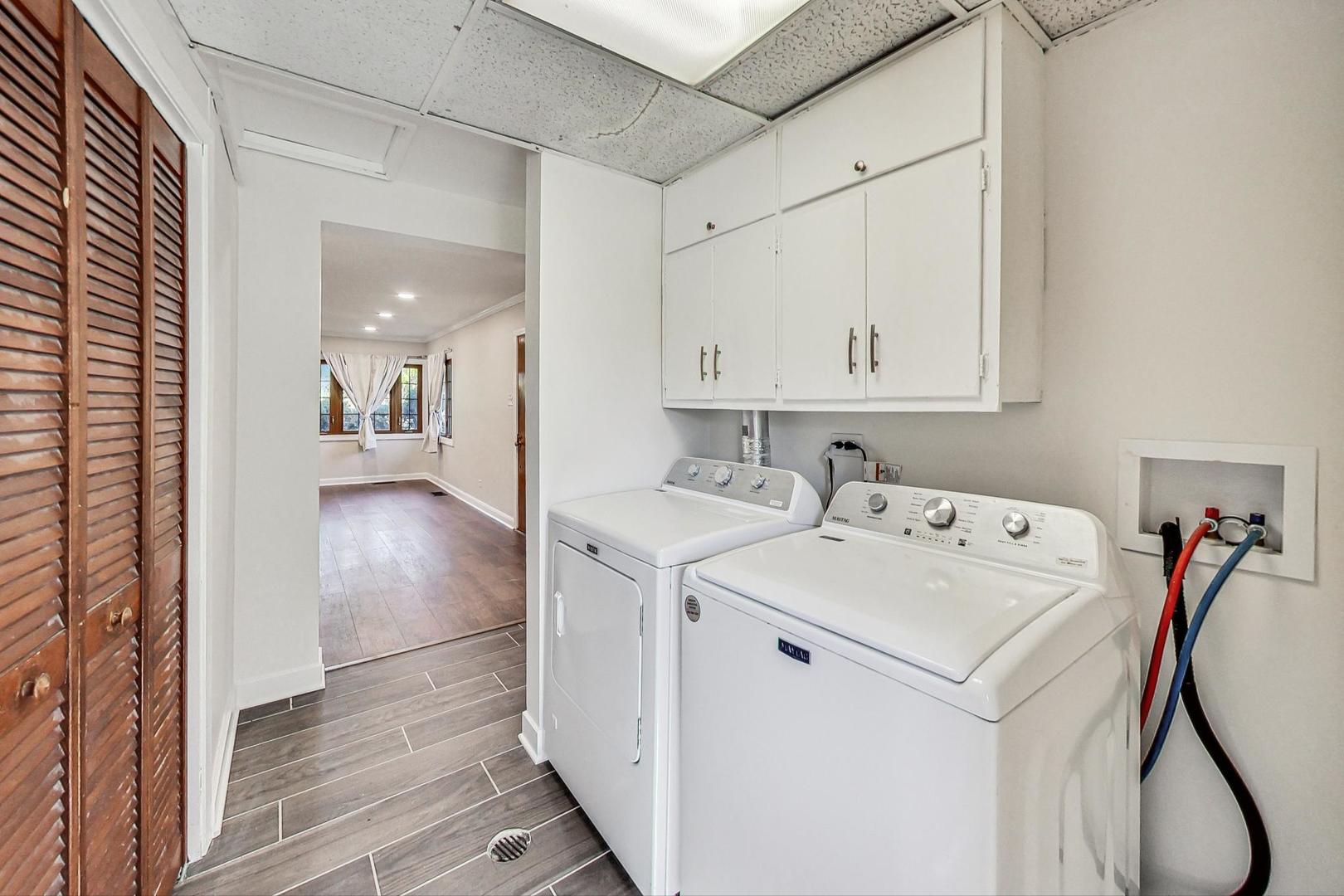 1205 183rd Street Homewood, IL 60430 - Photo 15 of 20 a view of storage and utility room with washer and dryer