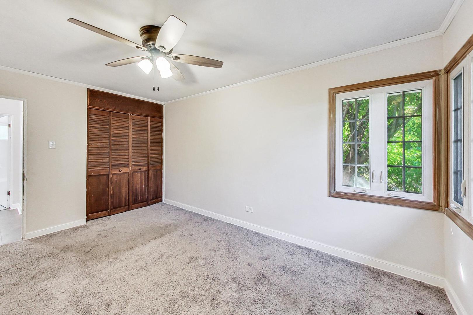 1205 183rd Street Homewood, IL 60430 - Photo 8 of 20 an empty room with chandelier fan