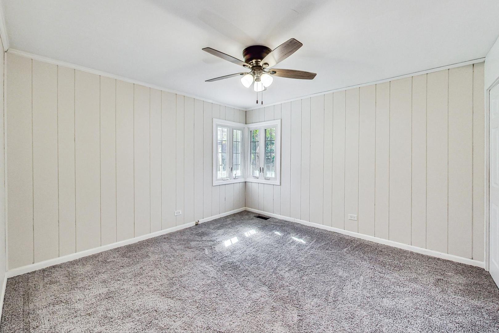 1205 183rd Street Homewood, IL 60430 - Photo 10 of 20 a view of an empty room with a window
