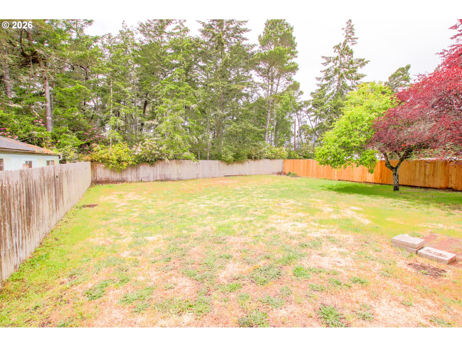 1431 Maple Street Florence, OR 97439 - Photo 38 of 43 a view of a swimming pool with an outdoor space and seating area