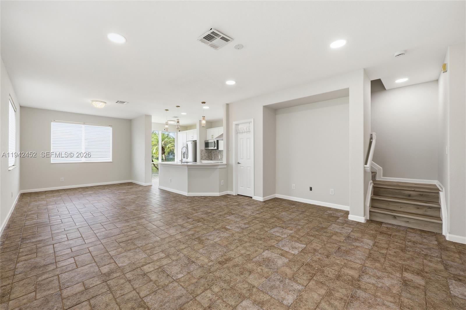 3059 Laurel Ridge Circle Riviera Beach, FL 33404 - Photo 3 of 25 a view of a kitchen and a window