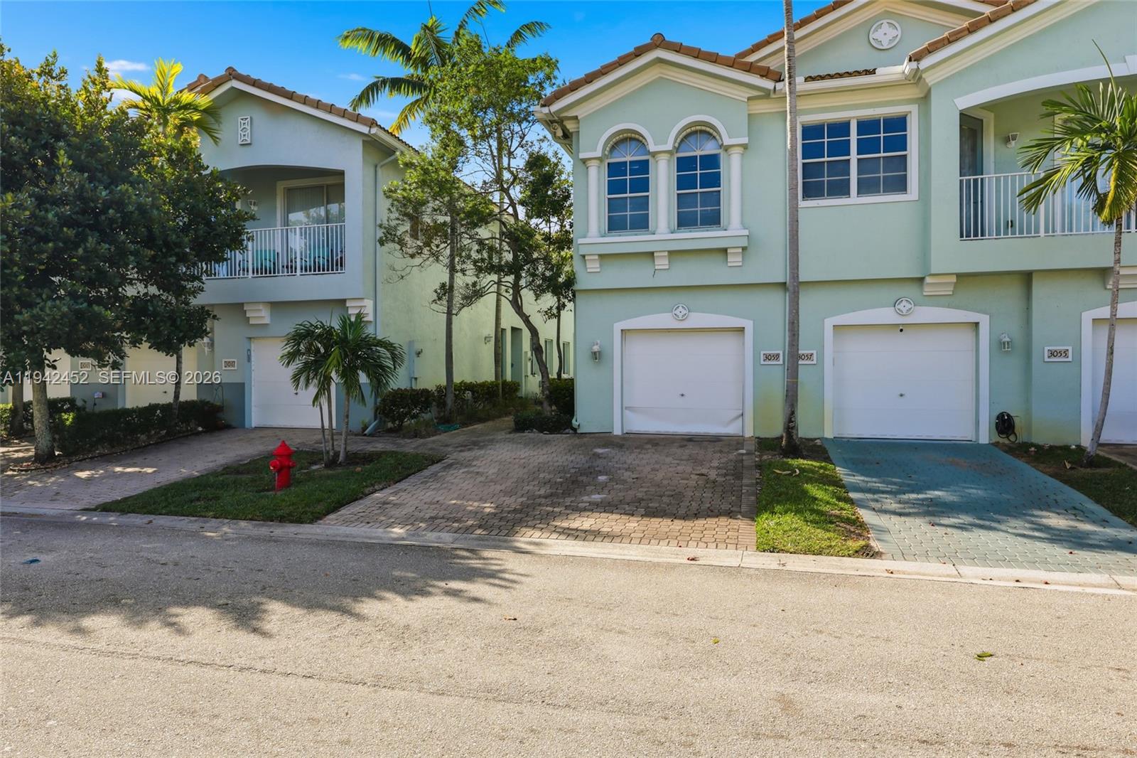 3059 Laurel Ridge Circle Riviera Beach, FL 33404 - Photo 8 of 25 a house view with a outdoor space