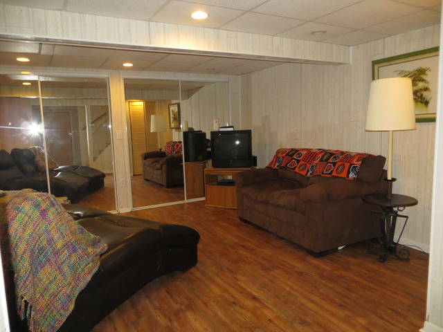 116 Julie Road Bolingbrook, IL 60440 - Photo 14 of 21 a bedroom with a bed and a lamp