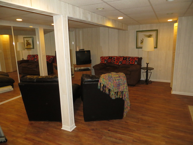 116 Julie Road Bolingbrook, IL 60440 - Photo 17 of 21 a view of a hallway with wooden floor windows and livingroom