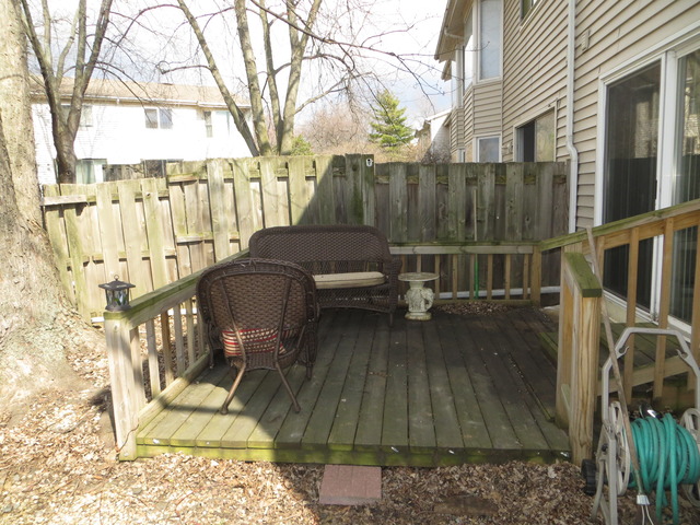 116 Julie Road Bolingbrook, IL 60440 - Photo 19 of 21 a view of balcony with wooden floor and outdoor seating