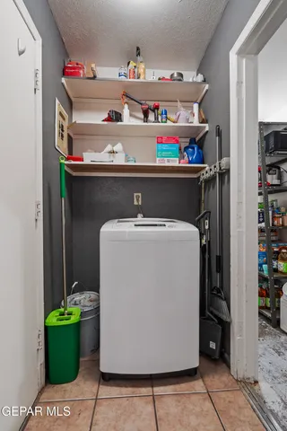 a utility room with washer and dryer