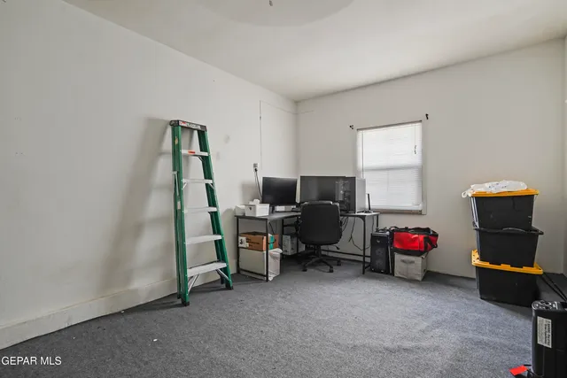 a room with furniture and a window