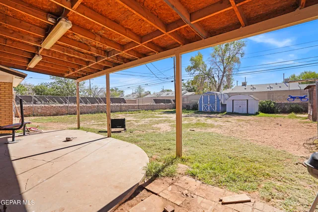 a room with pool table and glass windows