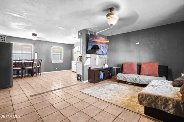 a bedroom with furniture and a chandelier