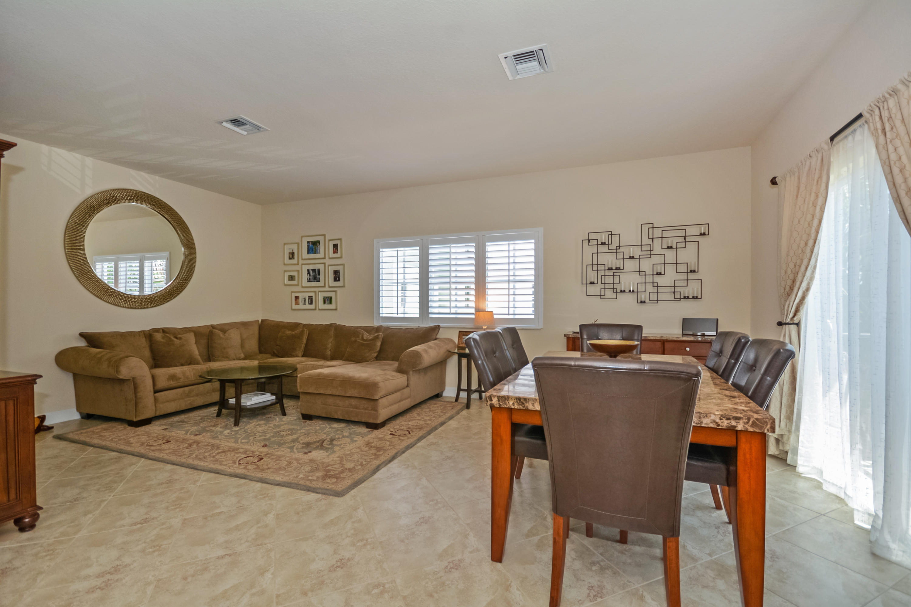 87 Northwest Hawthorne Place Boca Raton, FL 33432 - Photo 16 of 38 Living Room / Dining Room