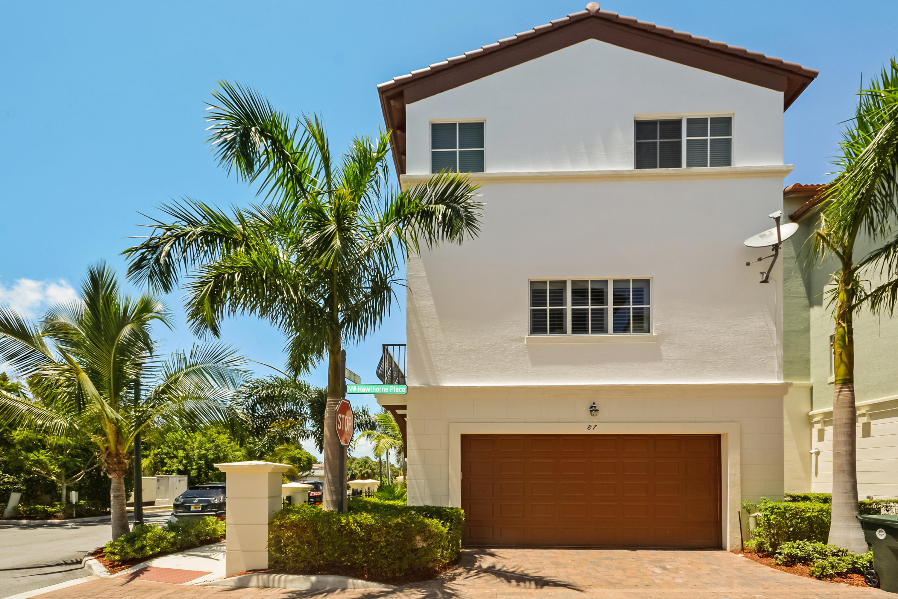 87 Northwest Hawthorne Place Boca Raton, FL 33432 - Photo 9 of 38 Garage Entry