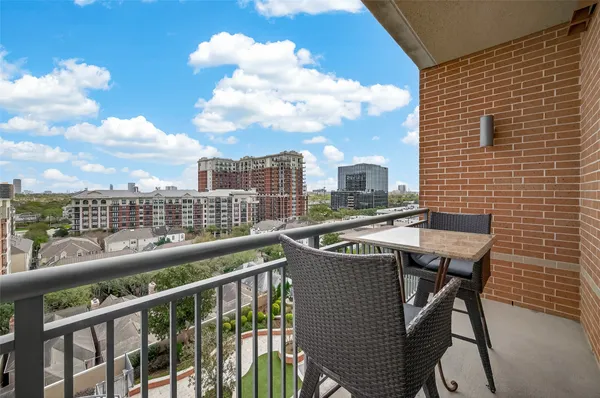 an aerial view of a house with a swimming pool