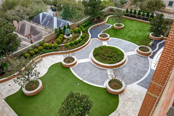 a view of a swimming pool with a table and chairs