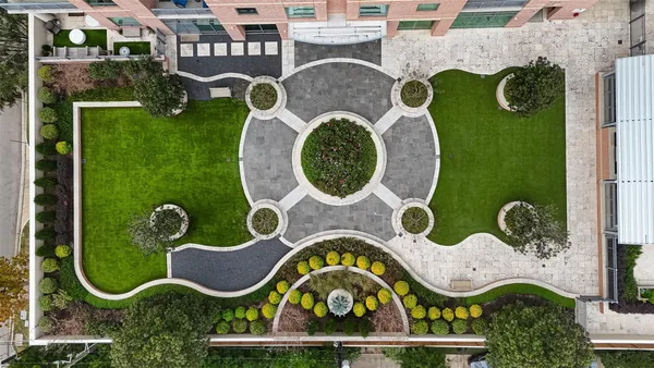 a view of a house with backyard and porch