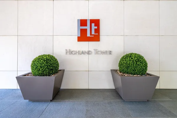 a view of a building with a street