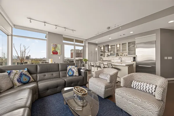 a view of storage and utility room with washer and dryer