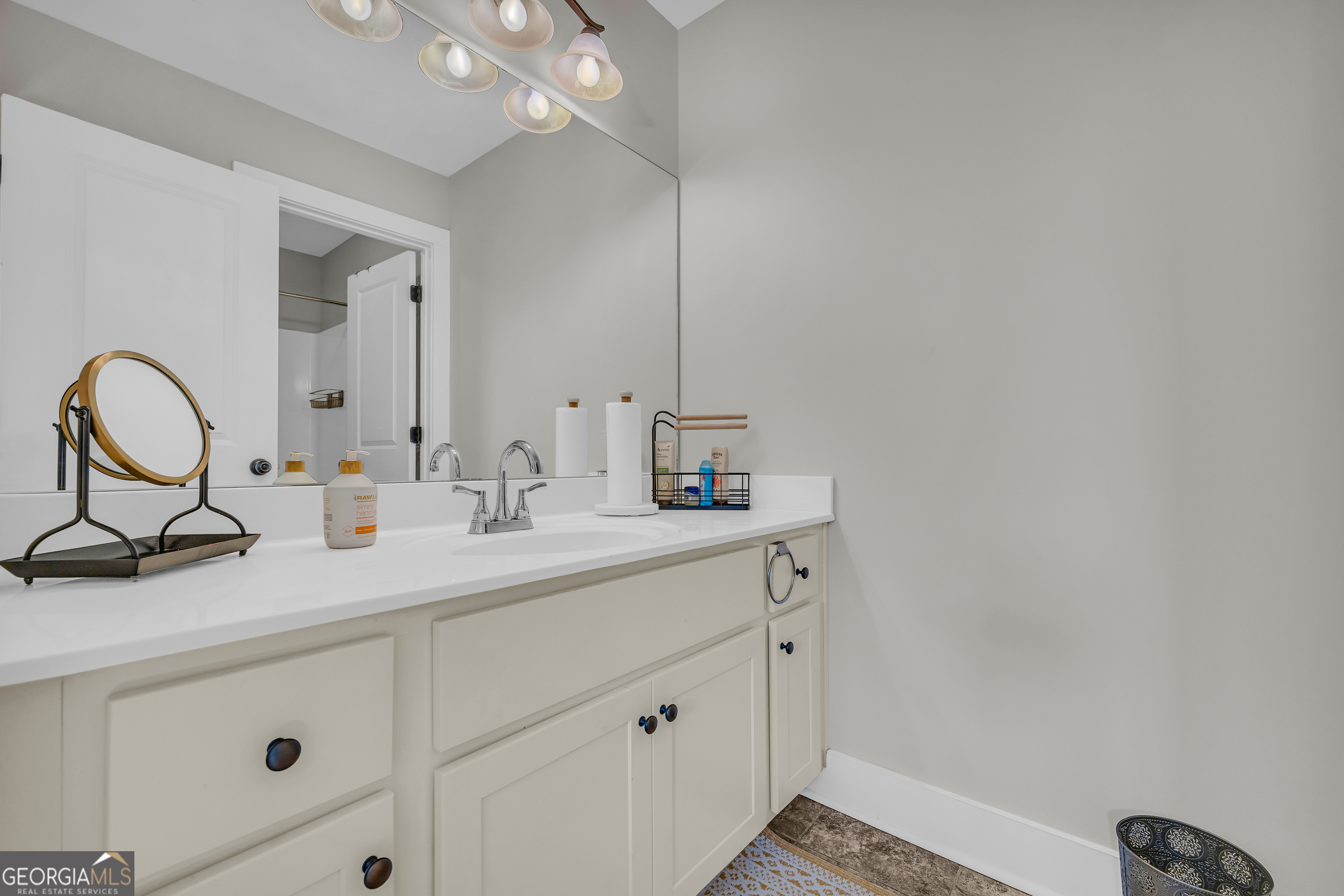 236 Melba Lane Athens, GA 30606 - Photo 22 of 33 a bathroom with a sink and a mirror