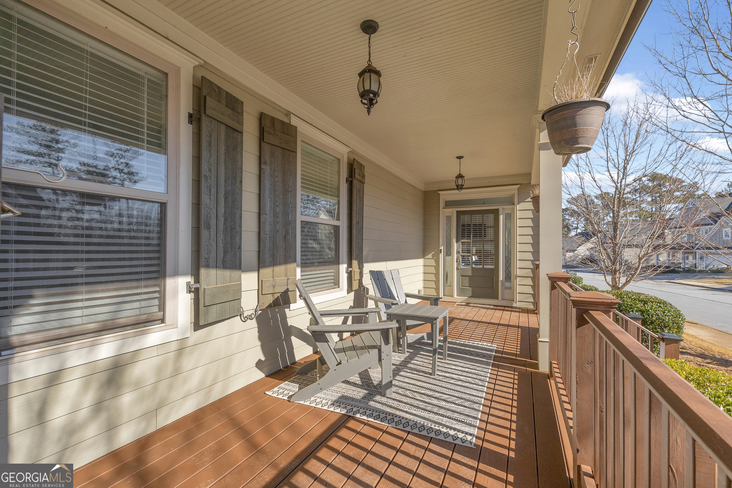 236 Melba Lane Athens, GA 30606 - Photo 5 of 33 a view of a patio with table and chairs and wooden floor