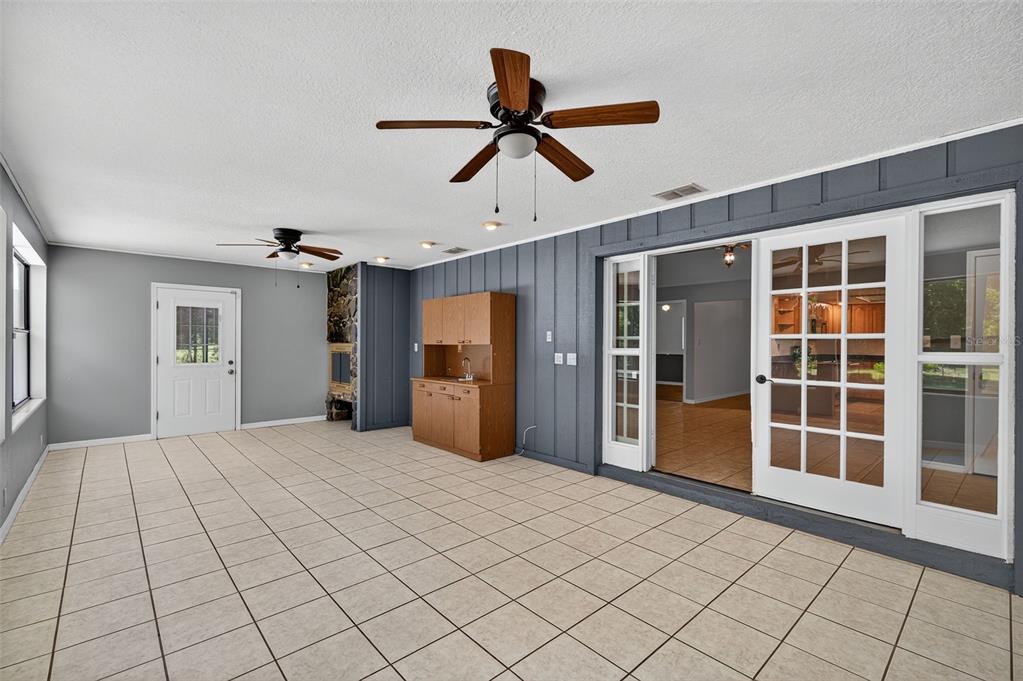 4618 Deeson Road Lakeland, FL 33810 - Photo 22 of 36 a view of empty room with wooden floor and window