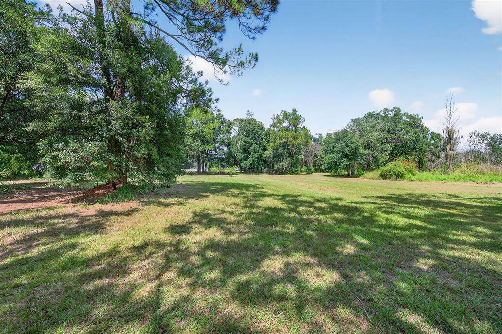 4618 Deeson Road Lakeland, FL 33810 - Photo 32 of 36 a view of outdoor space with trees all around