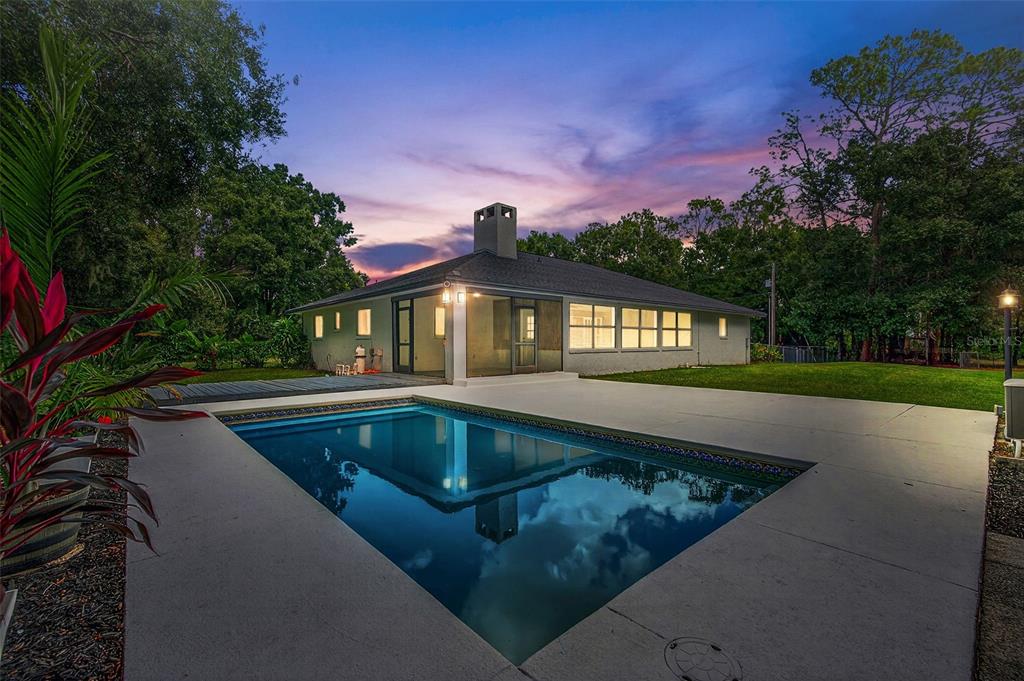 4618 Deeson Road Lakeland, FL 33810 - Photo 4 of 36 a view of swimming pool with a yard