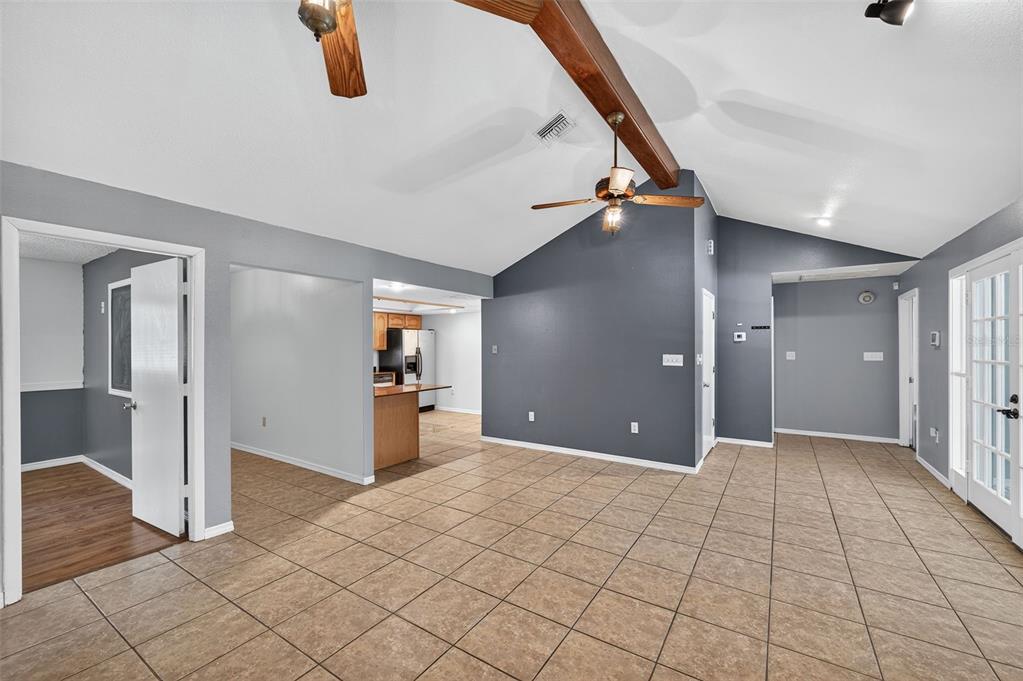 4618 Deeson Road Lakeland, FL 33810 - Photo 8 of 36 a view of a hallway with closet and wooden floor
