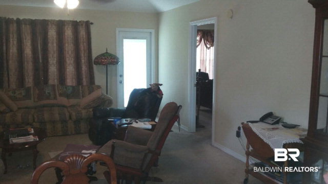 8877 Fall Court Mobile, AL 36695 - Photo 27 of 27 Lots of space to enjoy in this open floor plan. Ceilings in great room are trayed for added spaciousness.