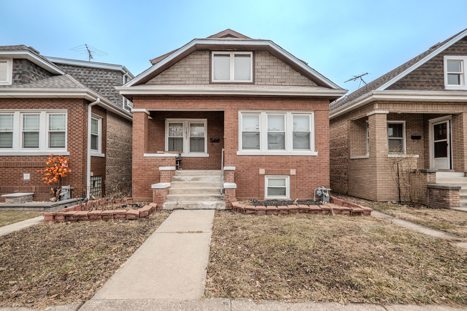 1435 Grove Avenue Berwyn, IL 60402 - Photo 1 of 25 front view of a house with a yard