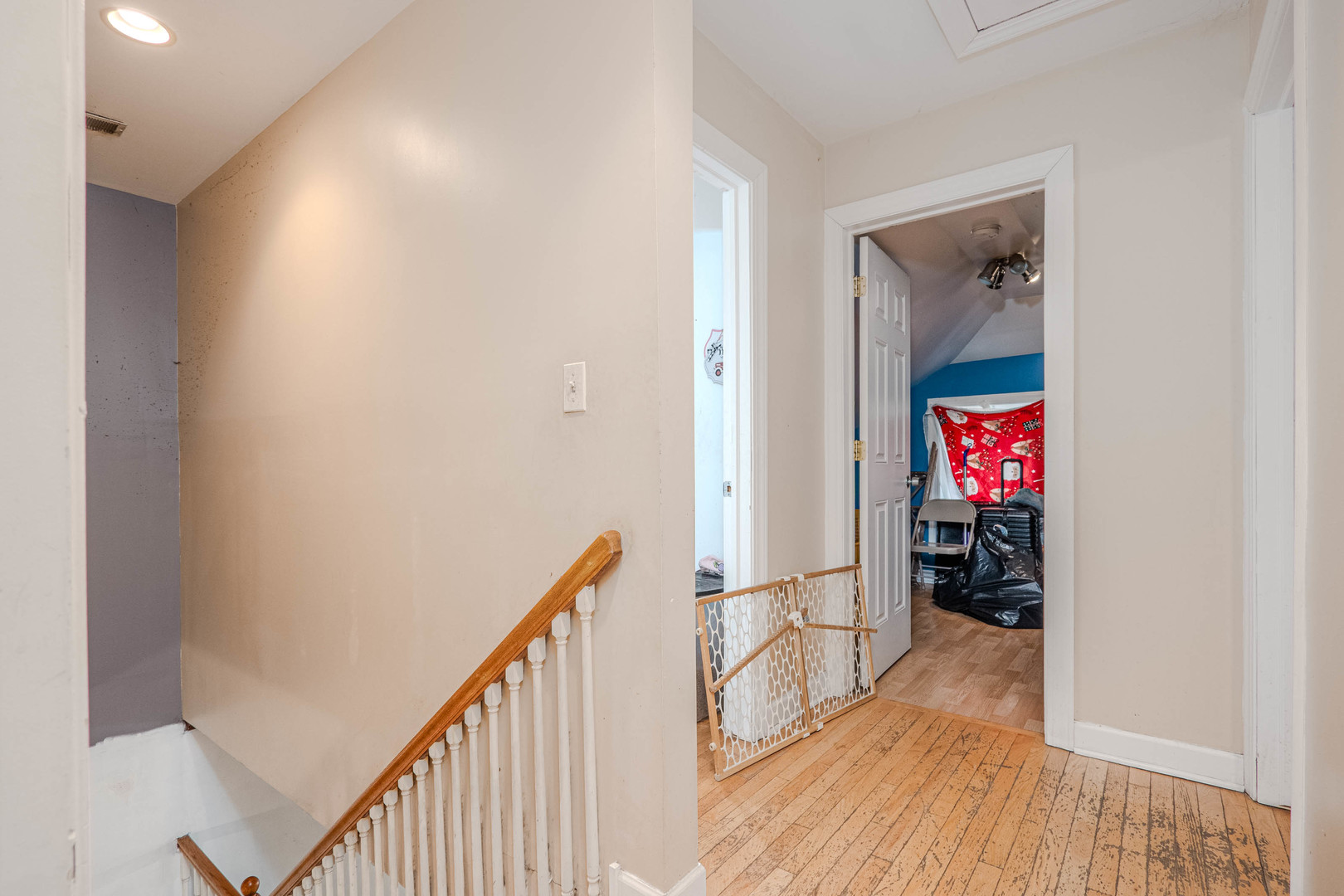1435 Grove Avenue Berwyn, IL 60402 - Photo 13 of 25 a view of a hallway with wooden floor and stairs