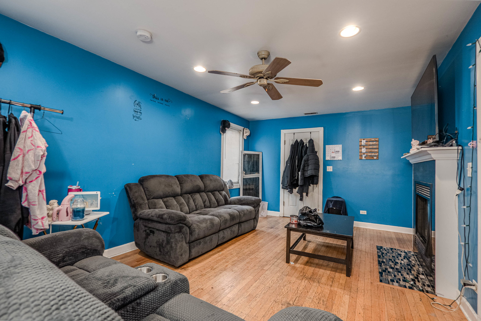 1435 Grove Avenue Berwyn, IL 60402 - Photo 14 of 25 a living room with furniture and a gym machine