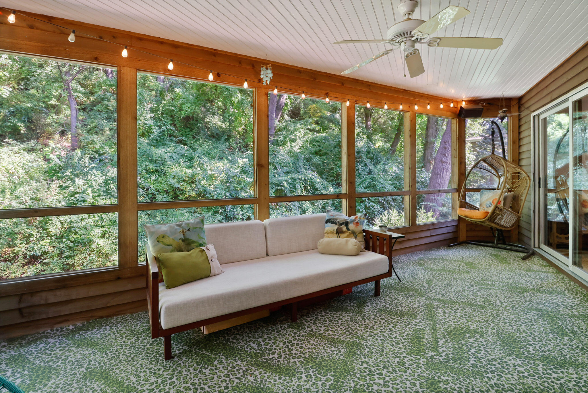66 Ski Hill Road Portage, IN 46368 - Photo 11 of 48 a living room with furniture and a floor to ceiling window