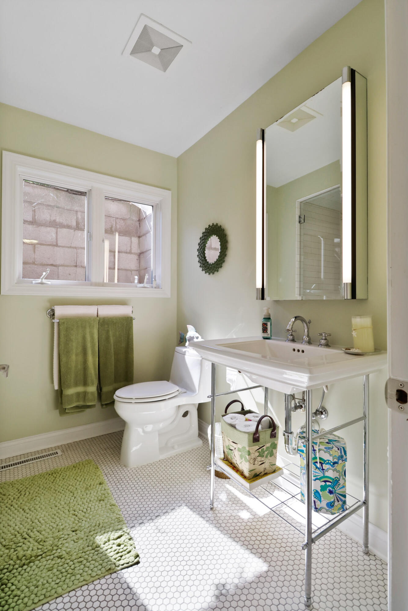66 Ski Hill Road Portage, IN 46368 - Photo 26 of 48 a bathroom with a sink a toilet and mirror