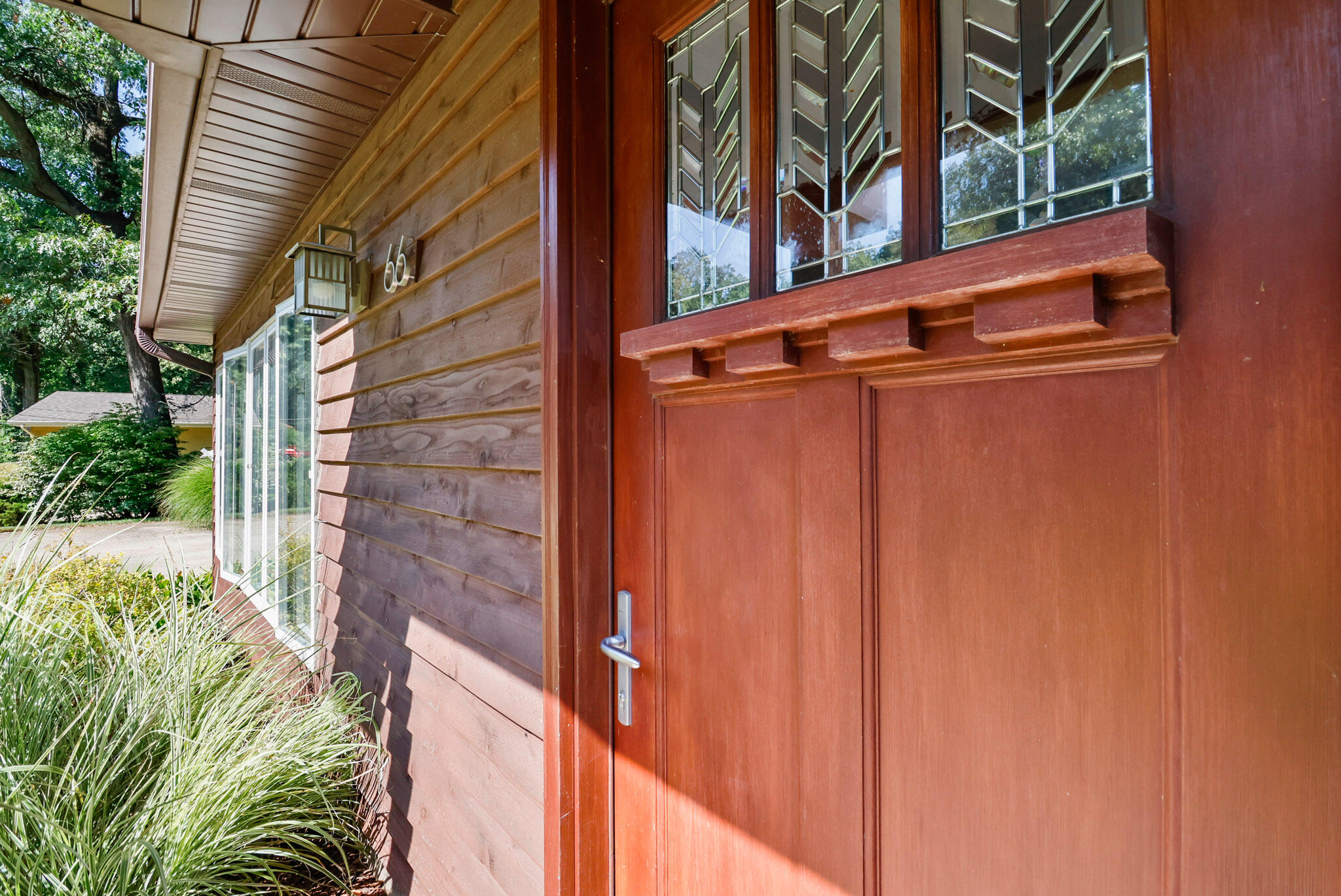 66 Ski Hill Road Portage, IN 46368 - Photo 3 of 48 a view of a door and chair in the balcony